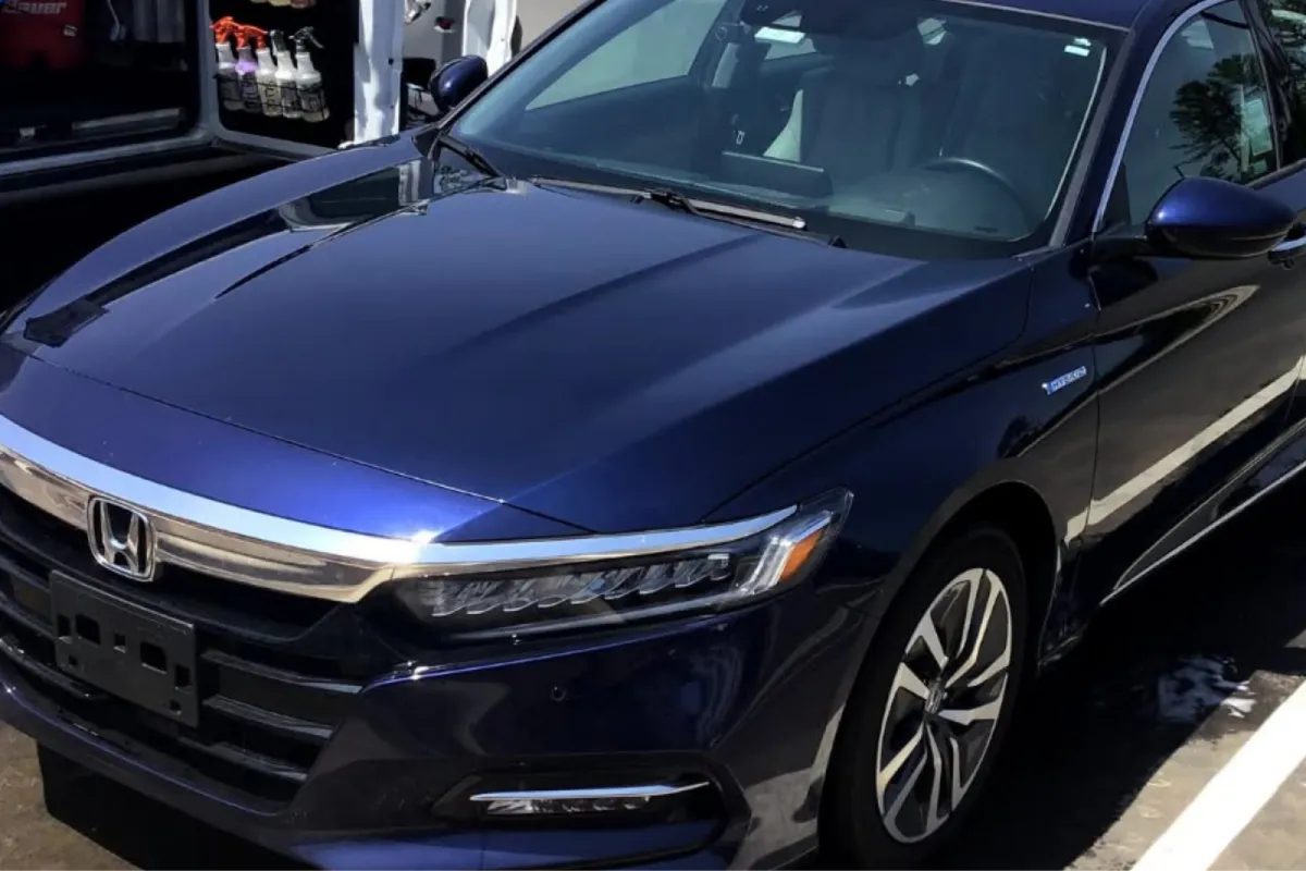 Blue Honda Accord sedan showing polished exterior after paint correction service.