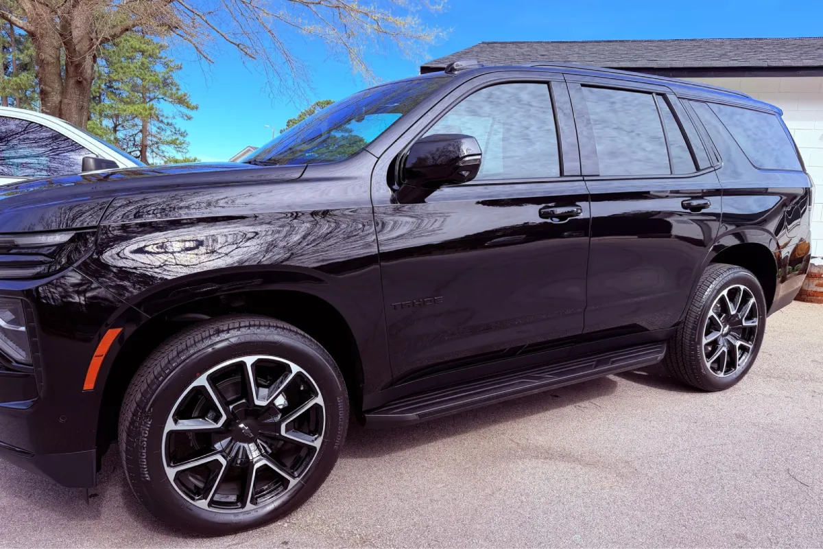 Chevrolet Tahoe featuring dark ceramic window tint.