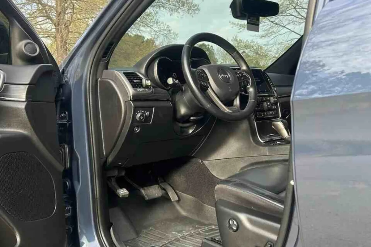 Detailed Jeep interior with cleaned dashboard and driver area.